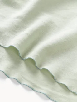 Westwing Collection Mantel redondo de lino con ribete Kennedy