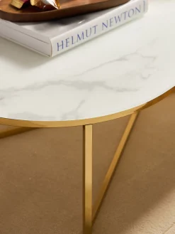 Westwing Collection Mesa de centro ovalada con tablero de vidrio en look mármol Antigua