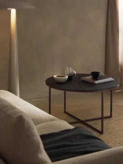 Westwing Collection Mesa de centro redonda con tablero de vidrio en look mármol Antigua